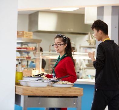 Abbey College Cambridge students helping themselves to the salad bar