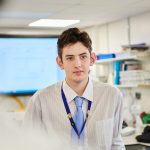 a student wearing a white shirt