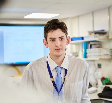 a student wearing a white shirt