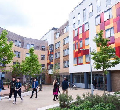 Abbey College Cambridge students walk bwteern classes