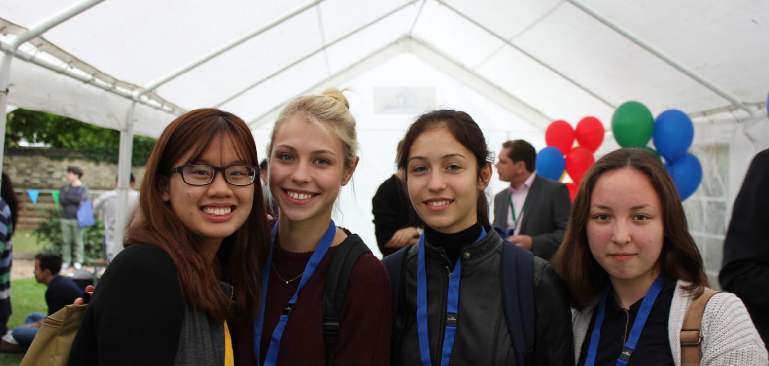 students in a tent