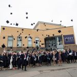 A Level hats thrown into the air