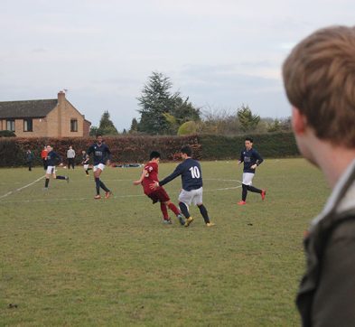 Students playing football