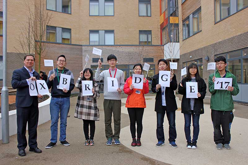 Students holding up letters that spell Oxbridge '17