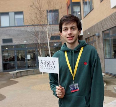 student holding a flag in his hand