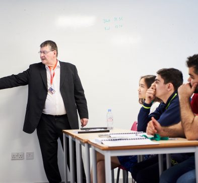 teacher teaching pupils