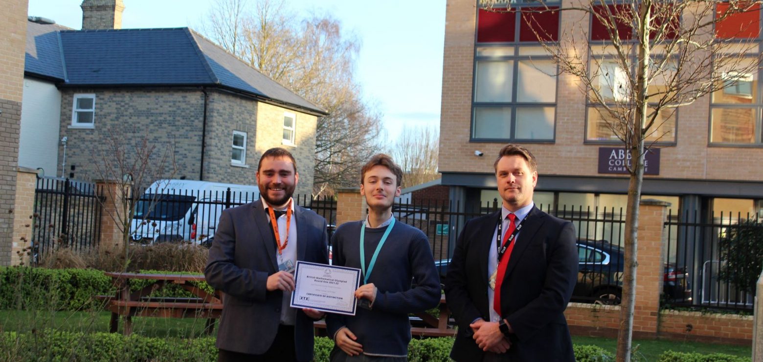 Juan receiving his top 100 British Mathematical Olympiad award