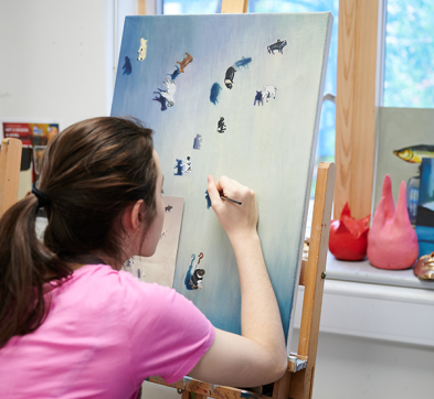 Abbey College Cambridge student painting in art studio