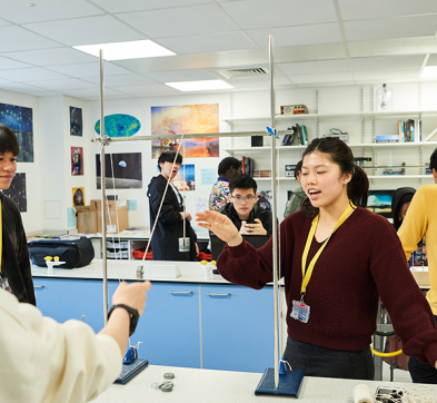 Abbey College Cambridge Students In Physics Lab