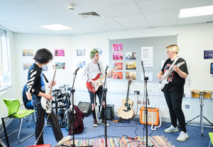Students Playing Music At Abbey College Cambridge
