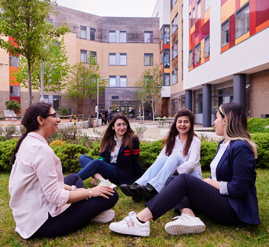 Students Relax In The Abbey College Cambridge Courtyard
