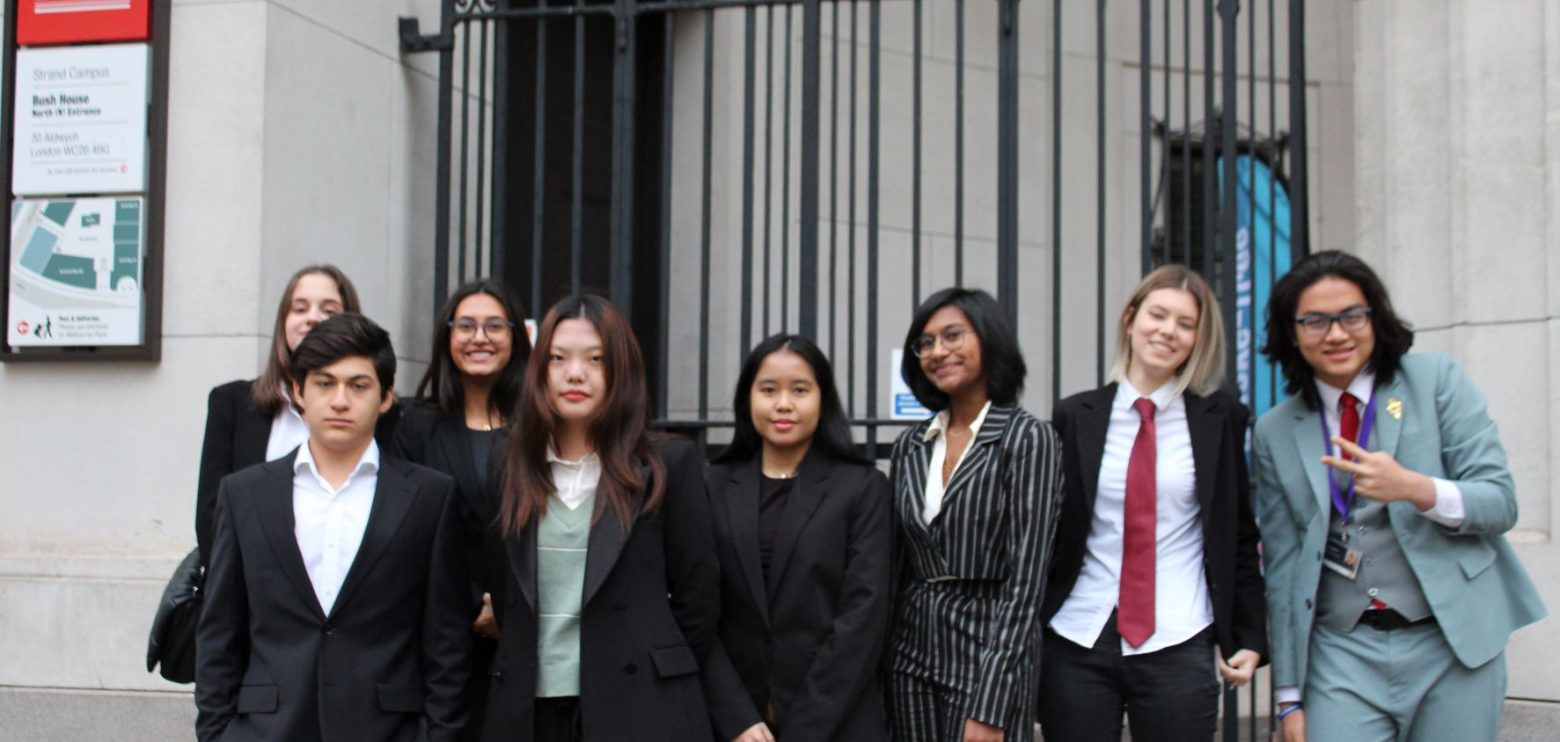 A group of students stood outside King's College in London