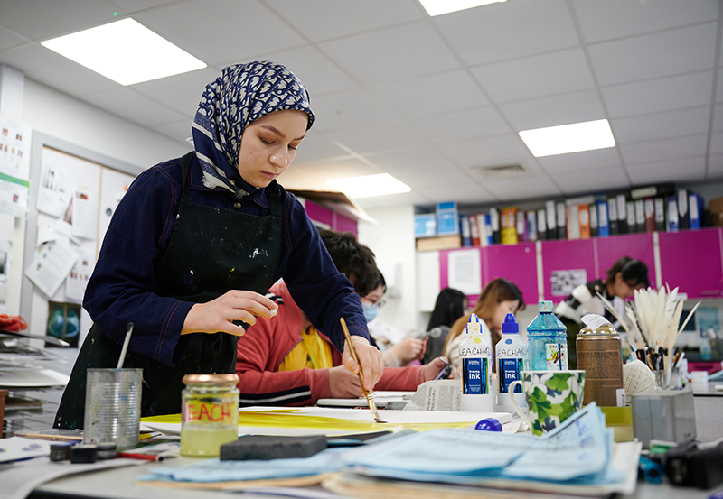 Abbey College Cambridge Female Student Working In Art Studio