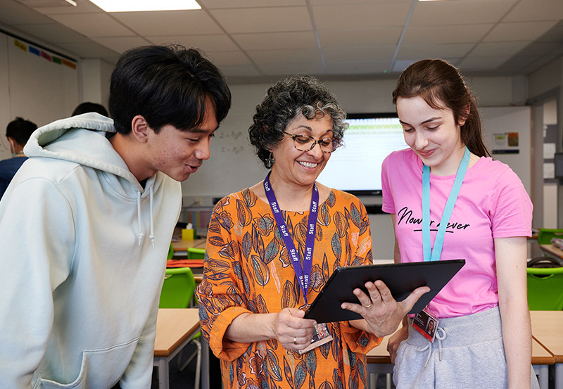 Abbey College Cambridge Students And Teacher Interact During Maths Class