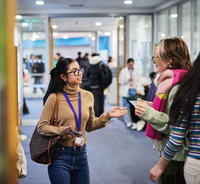Students Relaxing By The Common Room At Abbey College Cambridge