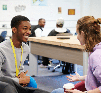 Students Relaxing In The Common Room At Abbey College Cambridge