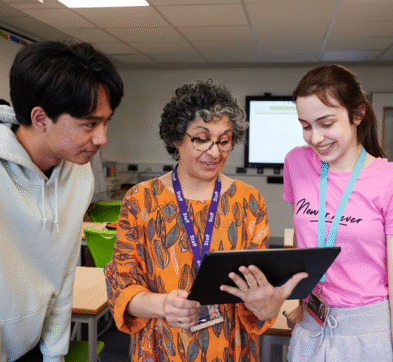Teacher And Students Working Im Maths Class At Abbey College Cambridge