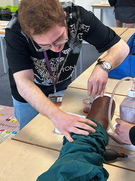 Male Student At Abbey College Cambridge Medical Conference