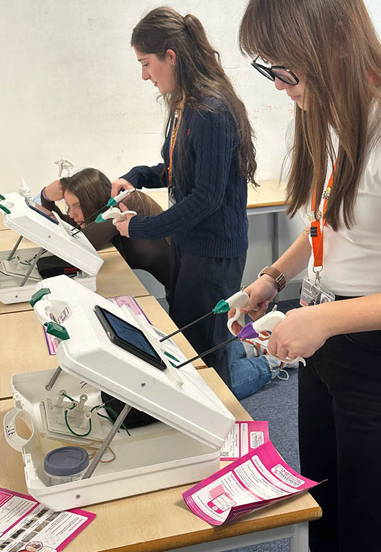 Students Performing Keyhole Surgery At Abbey College Cambridge Medical Conference